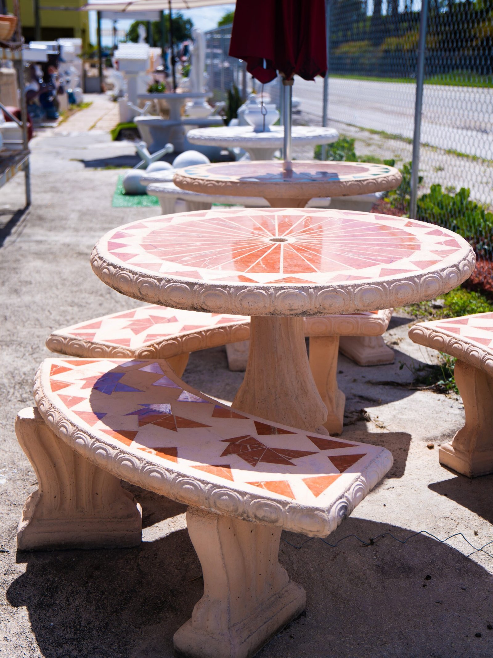 Terracotta table with terracotta tiles and benches